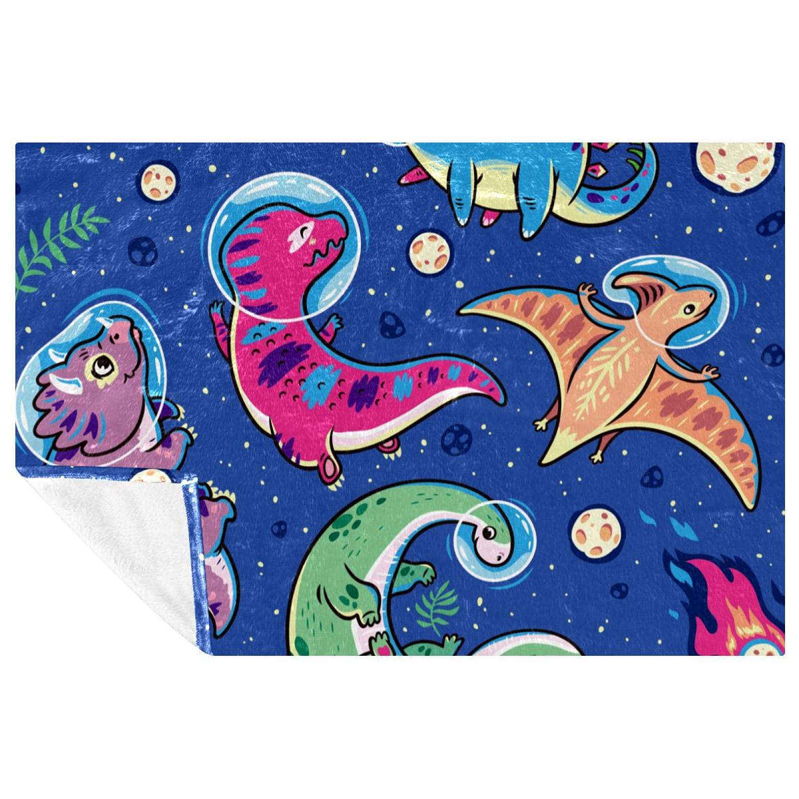 Couverture dinosaure astronaute bleu pour des moments cocooning doux et chaleureux