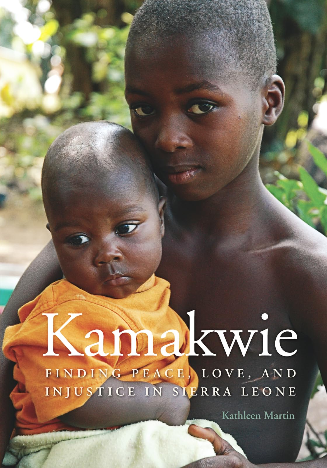 Kamakwie: Finding Peace, Love, and Injustice in Sierra Leone Paperback – November 18, 2011