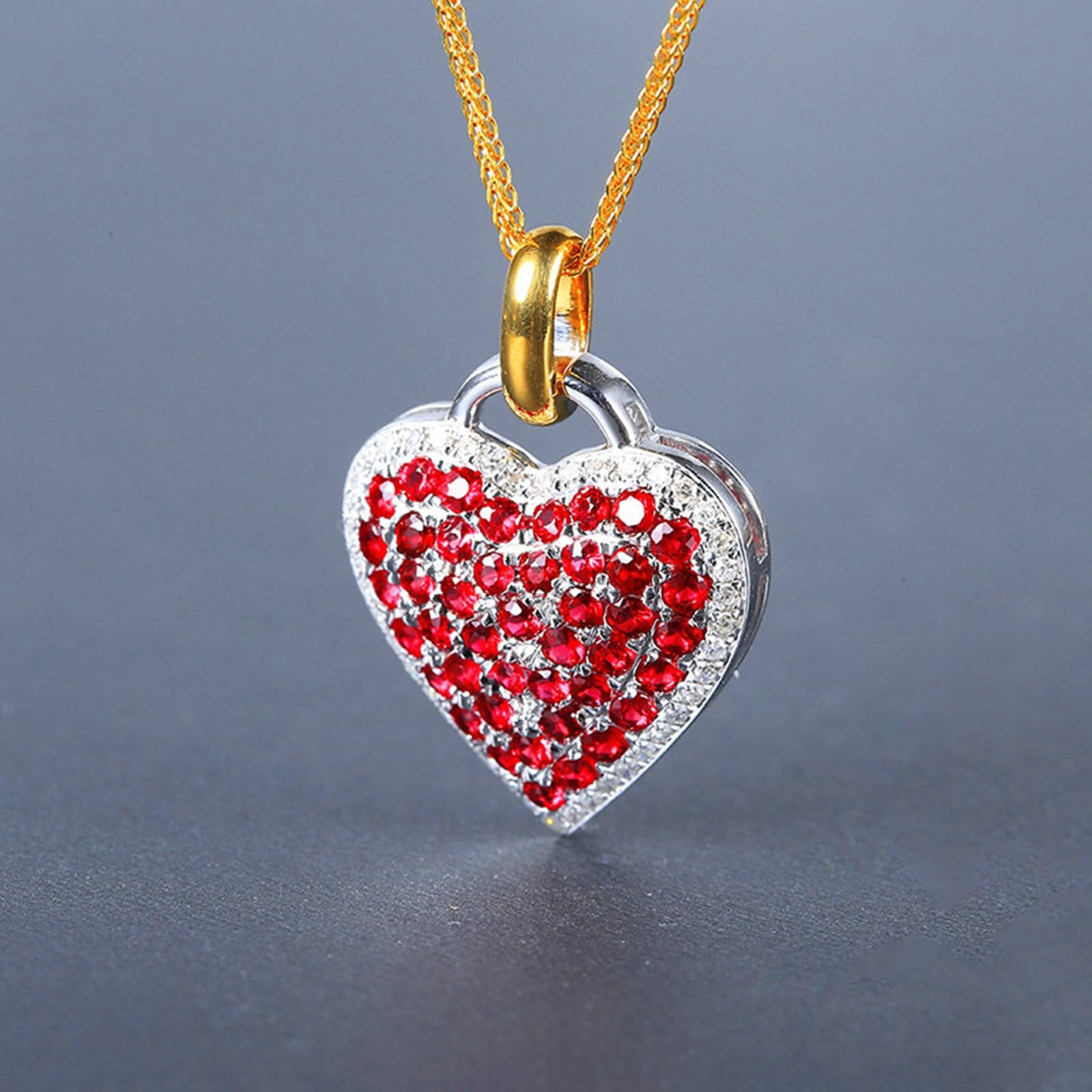 Colgante de corazón bicolor 375 585 750 con rubí 1,1 ct