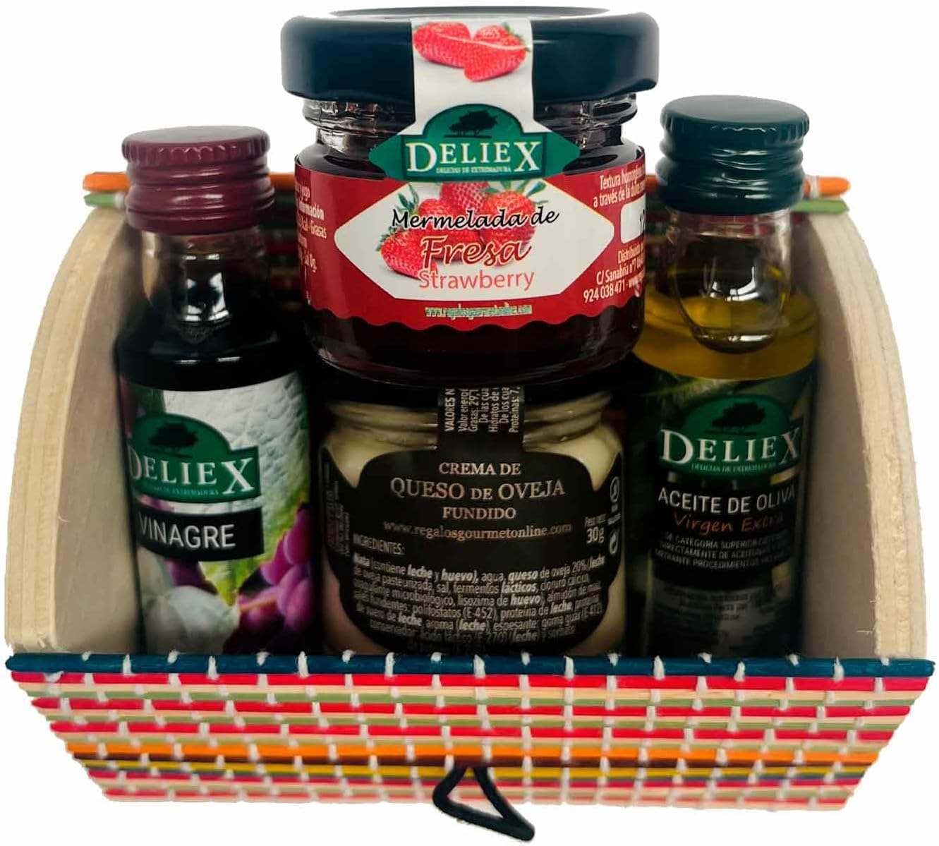 Baúl de madera multicolor con productos gourmet, miniaturas de aceite, vinagre, mermelada de fresa y queso oveja y vaca