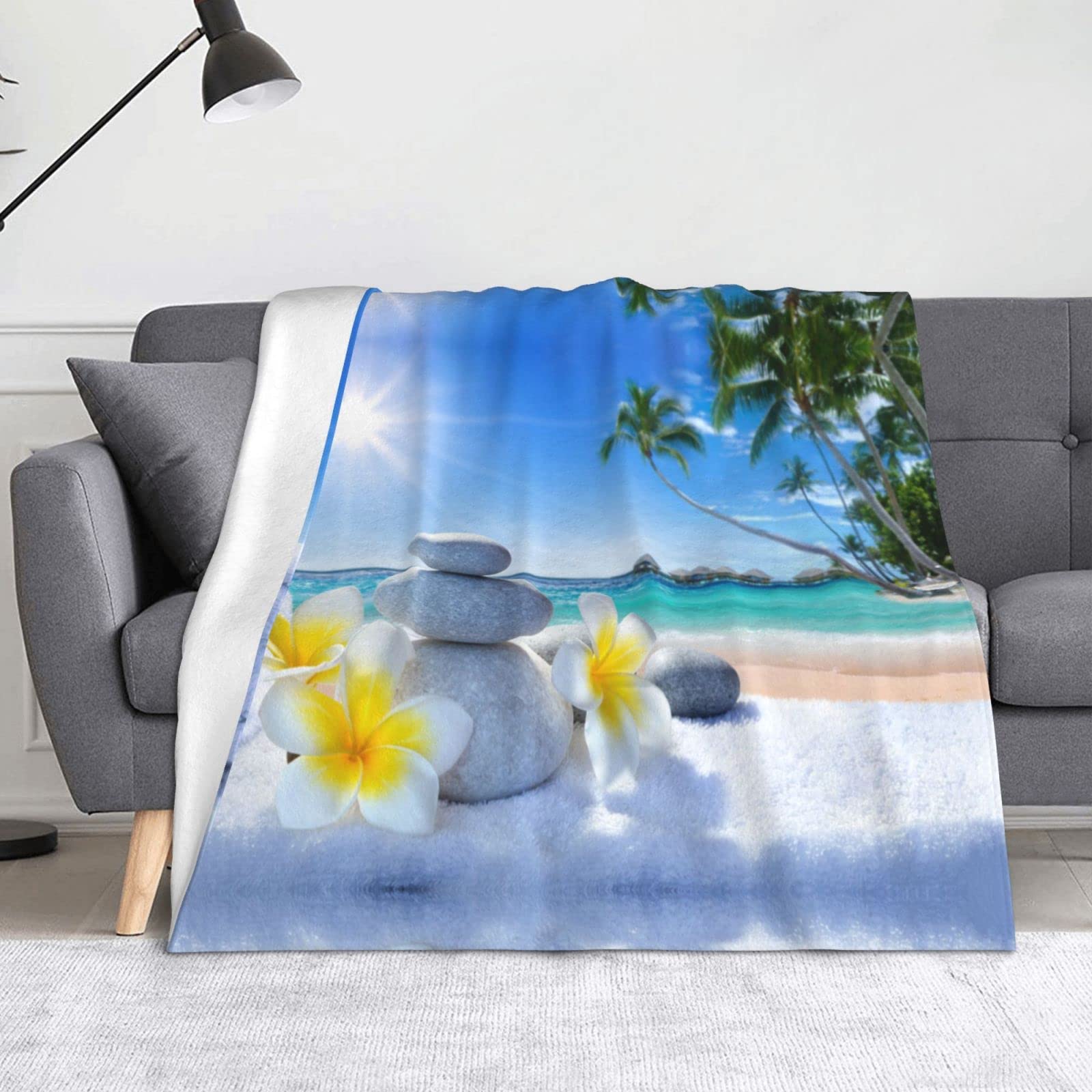 Couverture en flanelle tropicale et pierre zen pour lit et canapé
