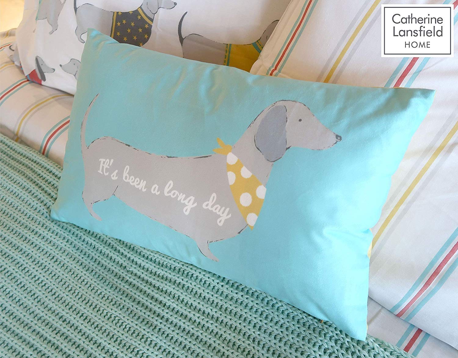 Catherine Lansfield Silly Sausage Dog Filled Cushion Multi 30x50cm