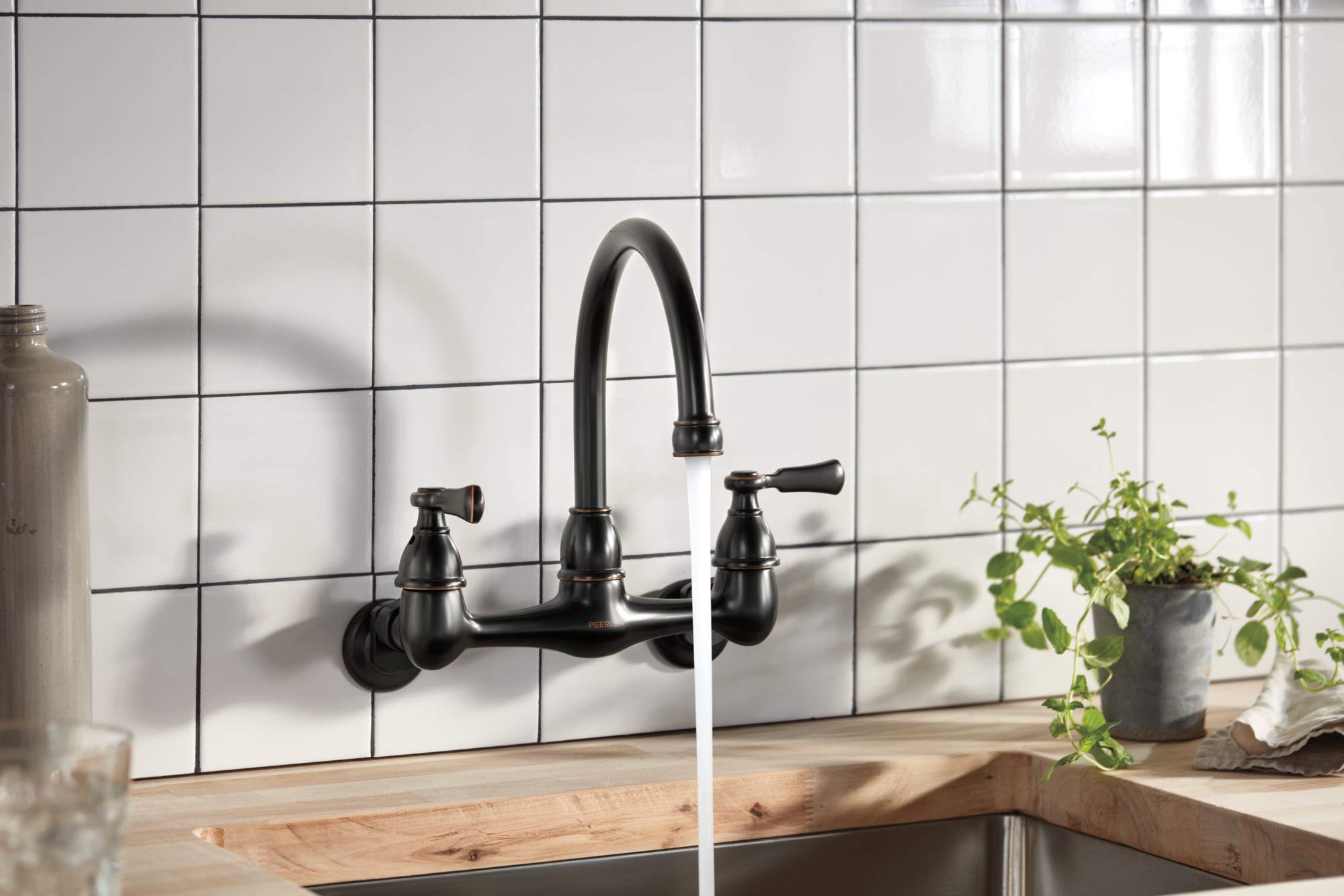 Peerless P2765LF-OB Elmhurst - Grifo de cocina de dos manijas, montaje en pared, bronce aceitado