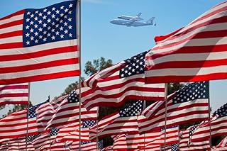 Posterazzi The final flight of the Space Shuttle Columbia flies on 92112 over US Flags at Peperdine University in Malibu CA Poster Print by Panoramic Images, (24 x 18)