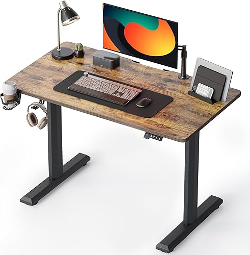 Miniatura 1 de FEZIBO Escritorio eléctrico de pie ajustable en altura, mesa de pie de 44 x 24 pulgadas, escritorio de oficina en casa con tablero de empalme,