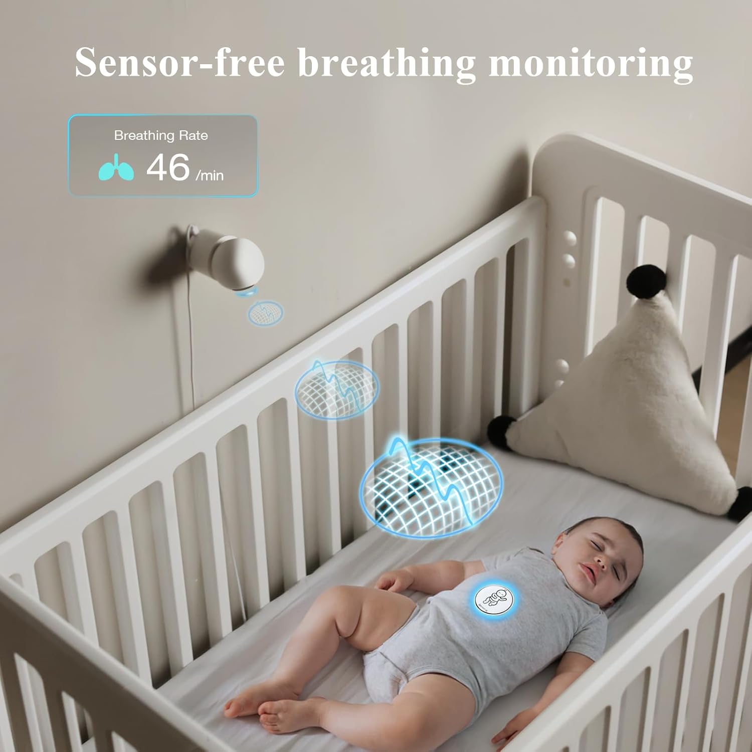 Baby in crib with Sense-U Breathing Badge clipped to diaper, showing breathing rate monitoring.