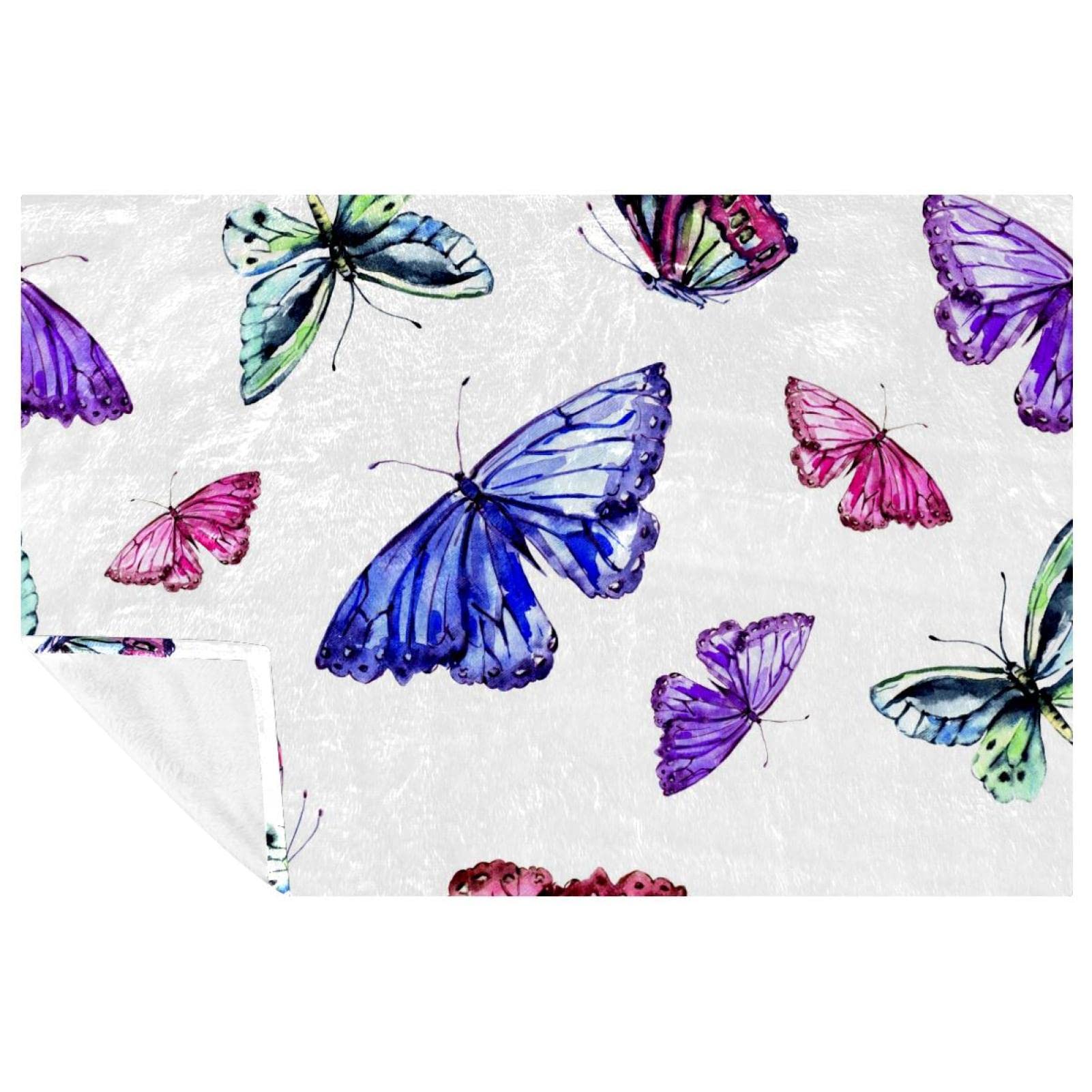 Couverture douce papillon : finis les frissons sur votre canapé