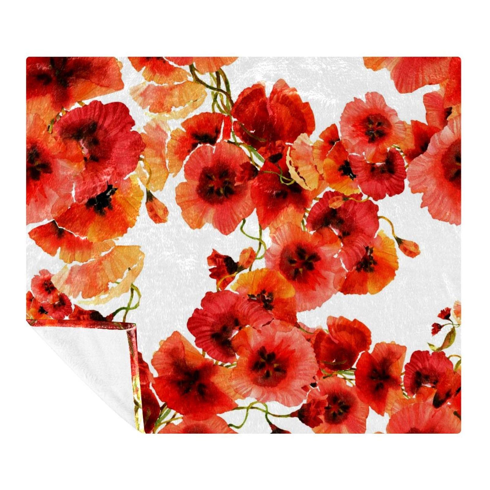 Couverture douce coquelicots pour des soirées cocooning sur le canapé