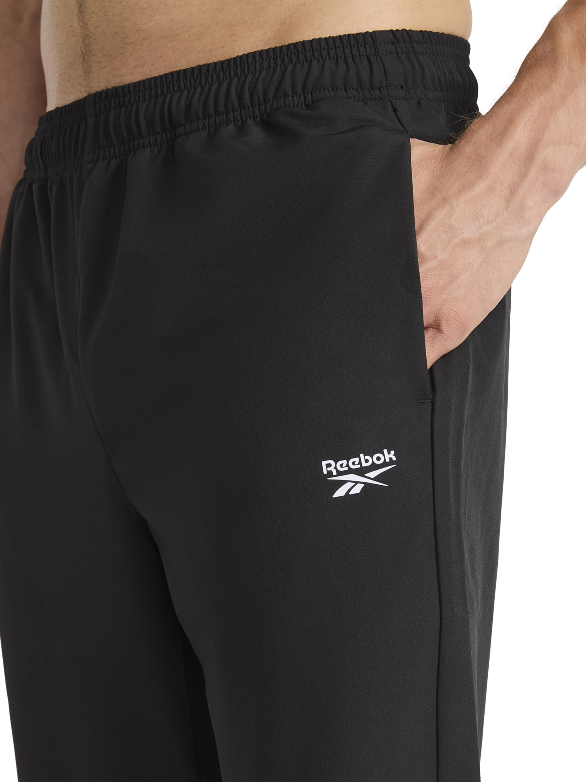 Reebok Herren Hose Repeat Woven Pant, Standard Fit, 30” Inseam, Lightweight Stretch Poly-Blend Fabric