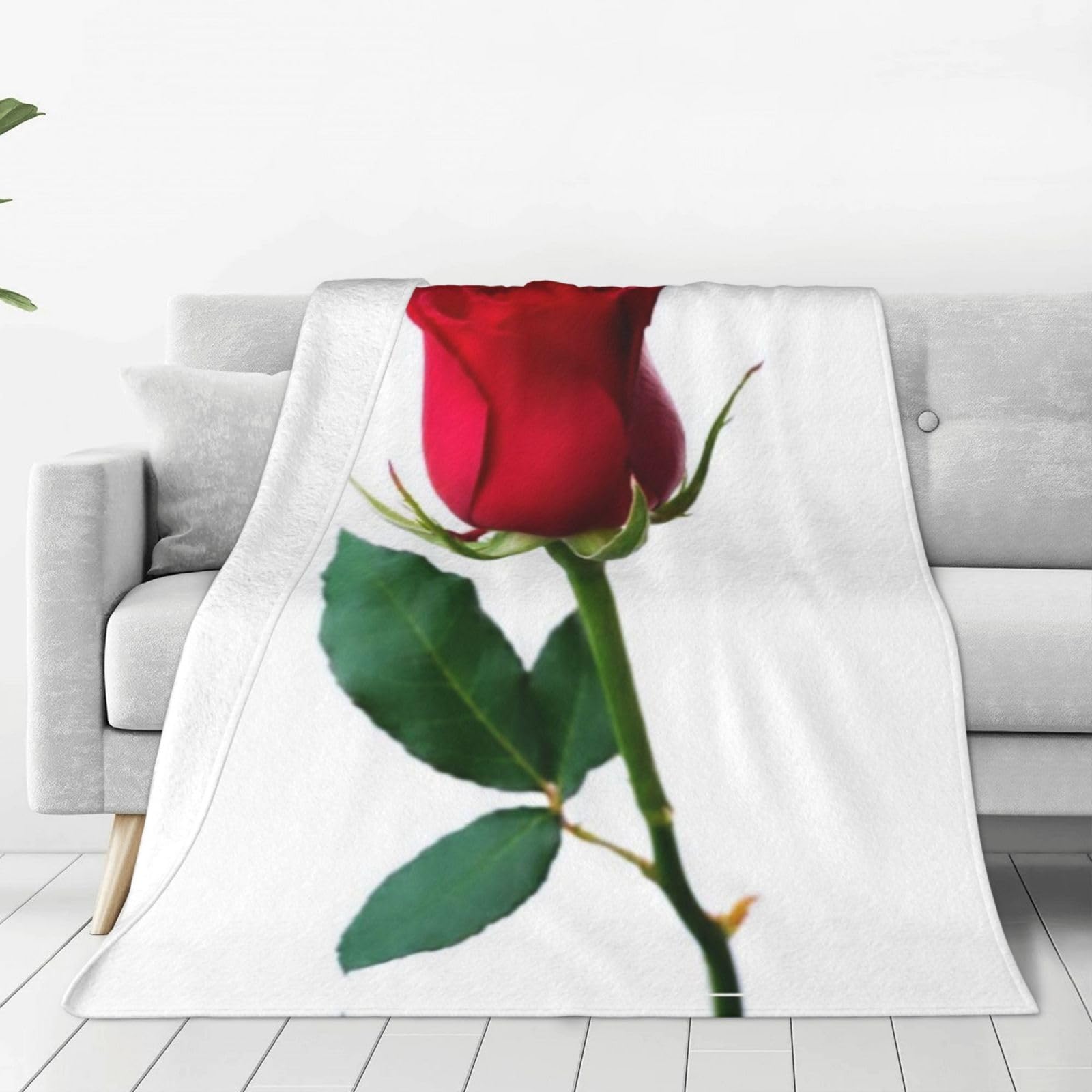 Couverture polaire imprimée rose rouge contre les frissons sur votre canapé