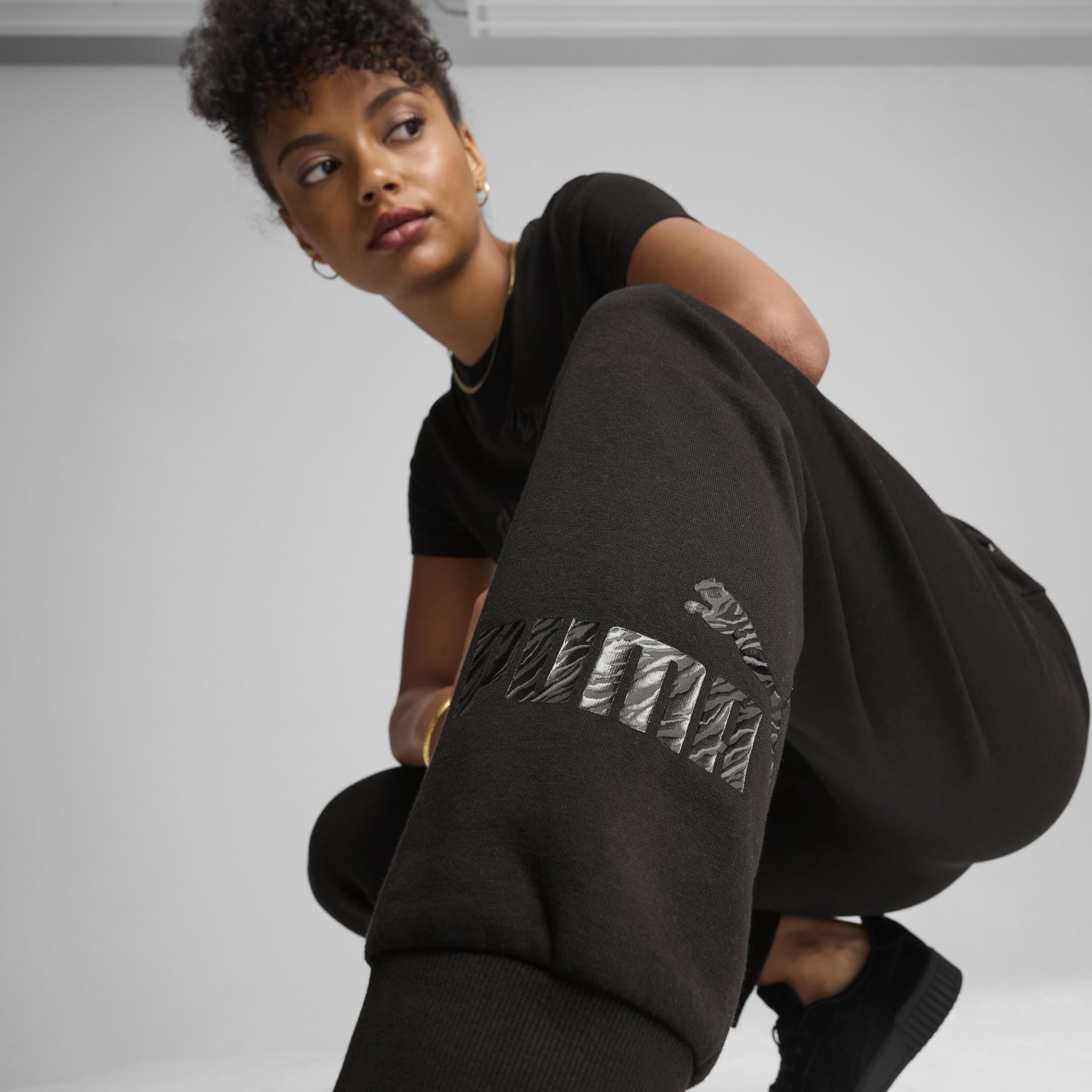 Puma - Ess+ Animal Pants FL, Pantaloni in Maglia Donna