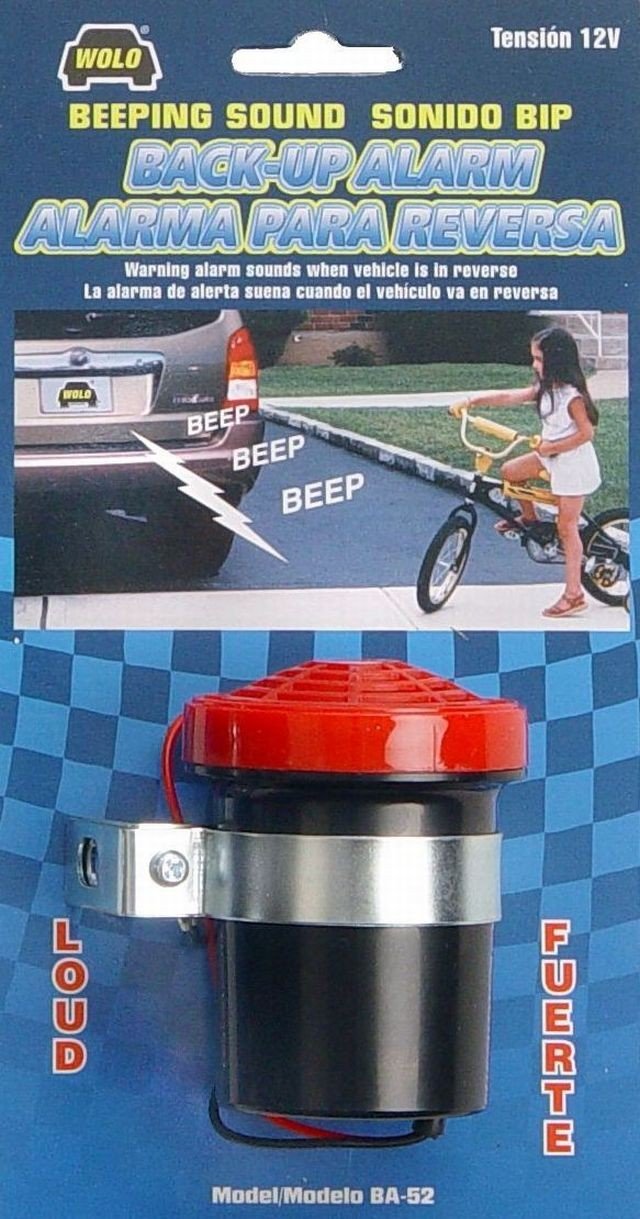 Wolo BA-52 Back-Up Alarm product packaging showing the alarm unit and an illustration of a car backing up with 'BEEP BEEP BEEP' sound waves.