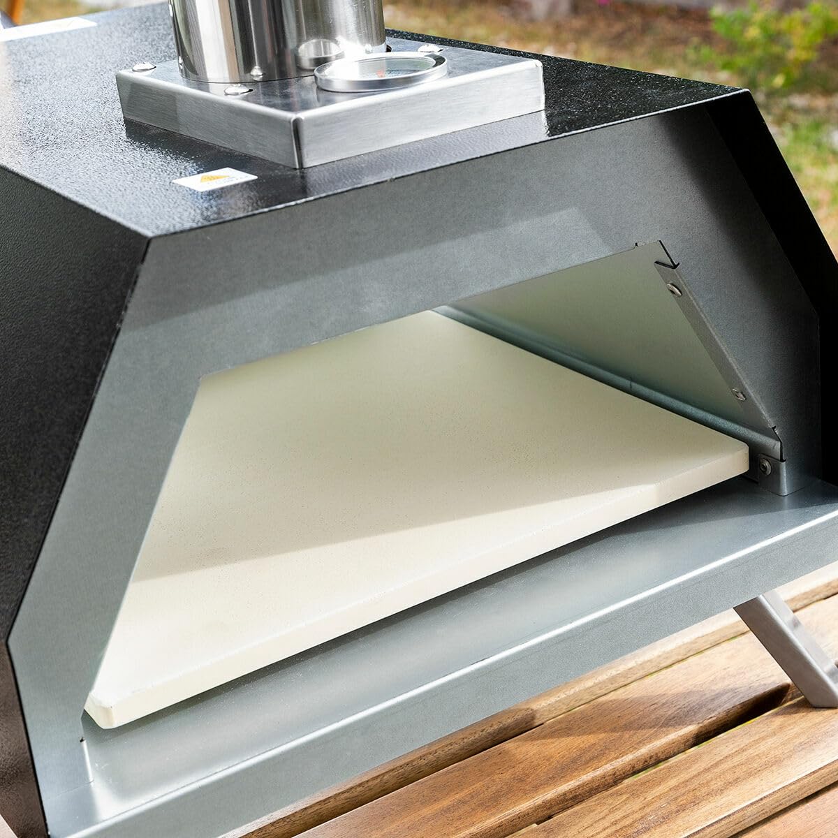 InnovaGoods® Horno pizza de pellets con accesorios, horno para pizza con Base de Piedra Ø 30cm máx. Rápida Cocción Hasta 500ºC y Pala para pizza de 30x30cm. Incluye Chimenea y Bolsa de Transporte.