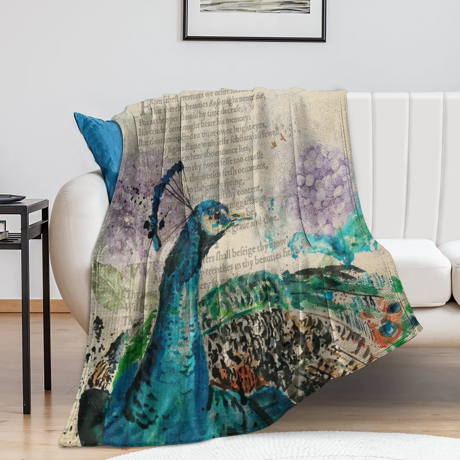 Couverture en polaire paon idéale pour vos soirées cocooning sur le canapé