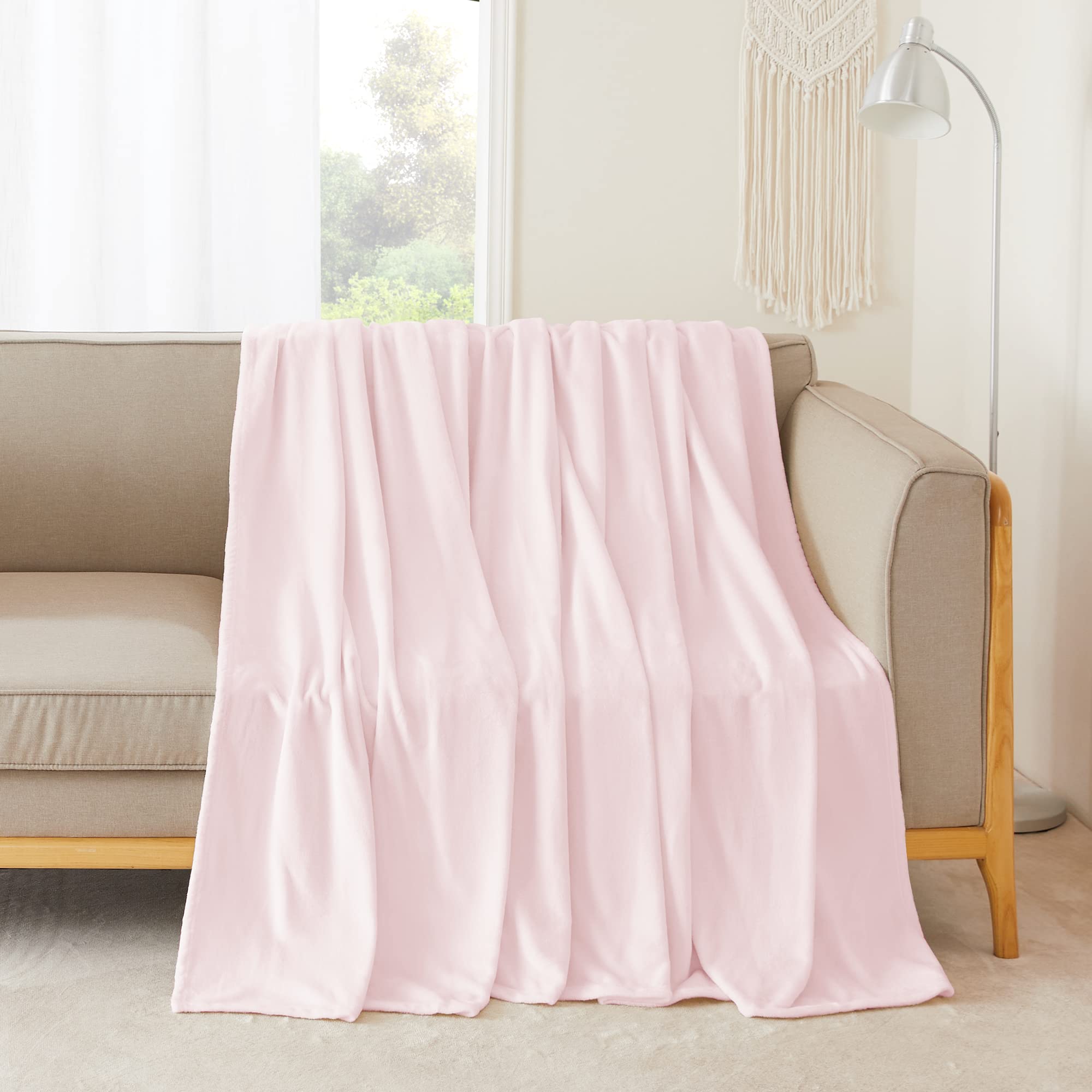 Couverture polaire rose douce : l'idée cadeau parfaite pour un confort absolu