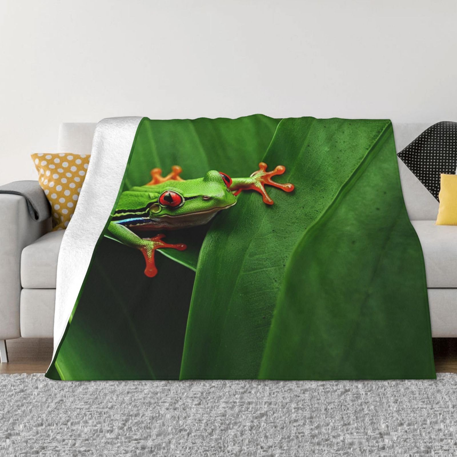 Plaid grenouille aux yeux rouges idéal pour voyage et sieste sur le canapé