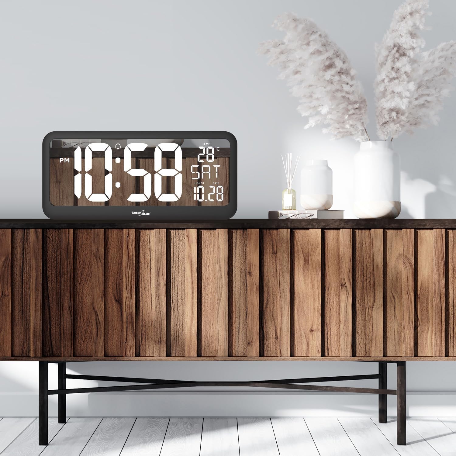 Green Blue GB214 Digital Wall Clock placed on a wooden cabinet