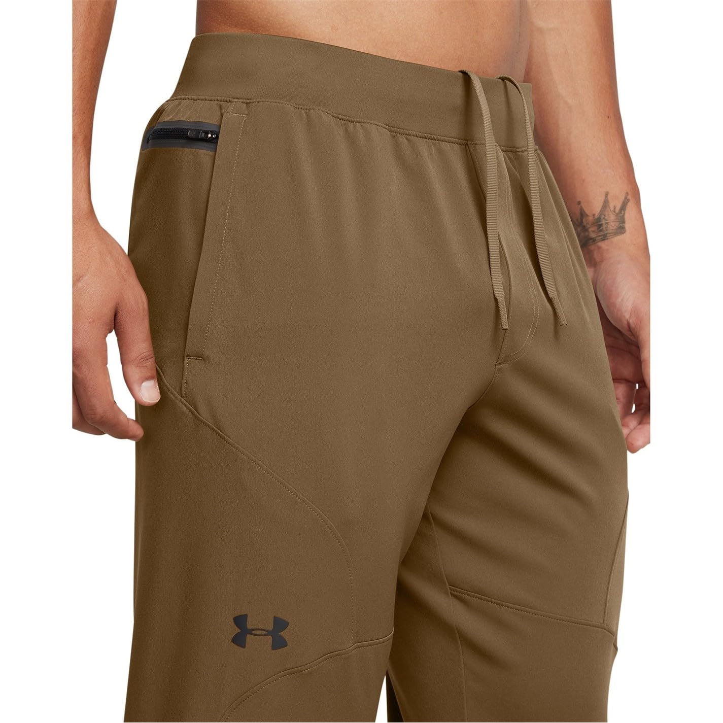 Under Armour Rozciągliwe tkane użytkowe spodnie treningowe zwężane - Spodnie Mężczyźni