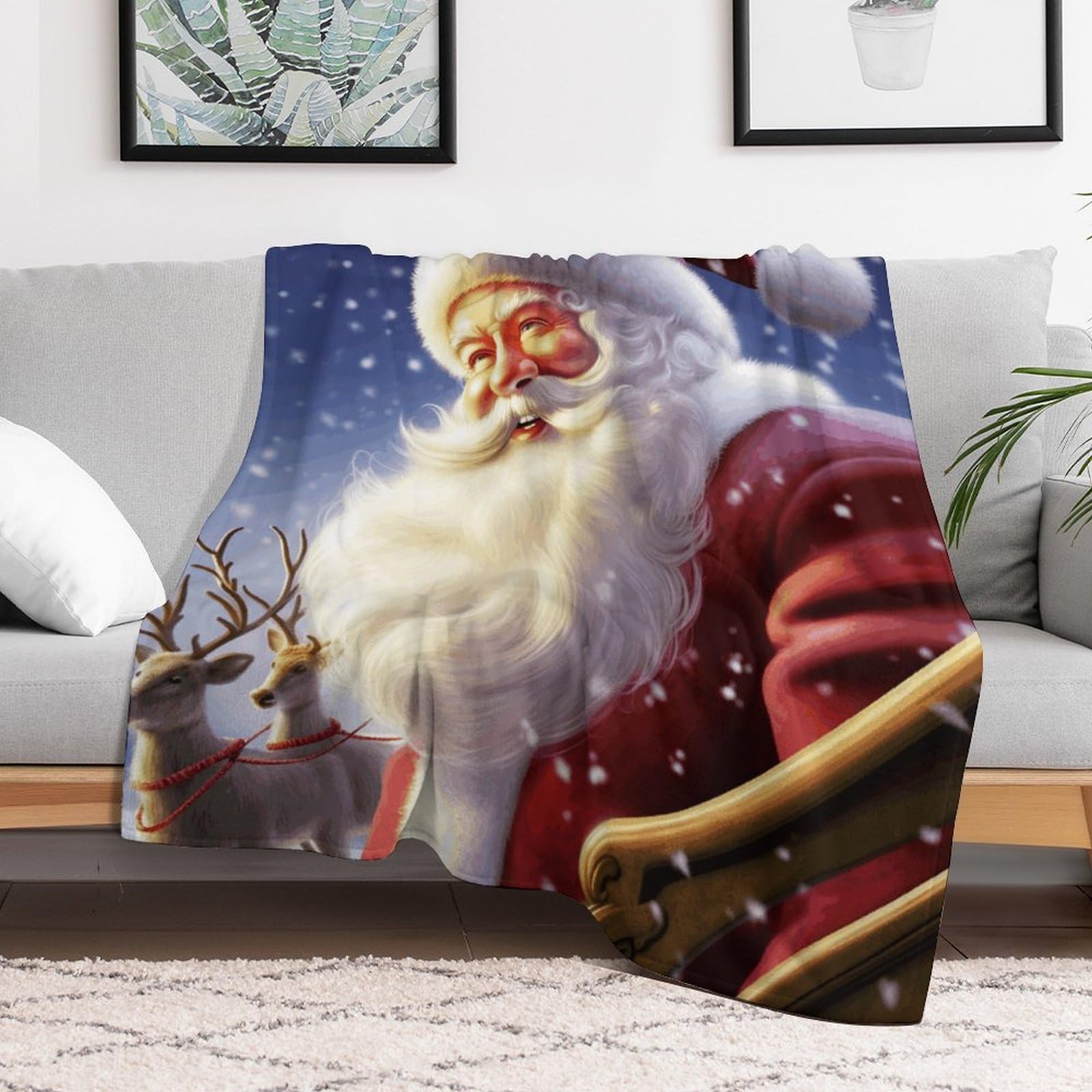 Plaid Père Noël souriant pour soirées cocooning au salon sur le canapé
