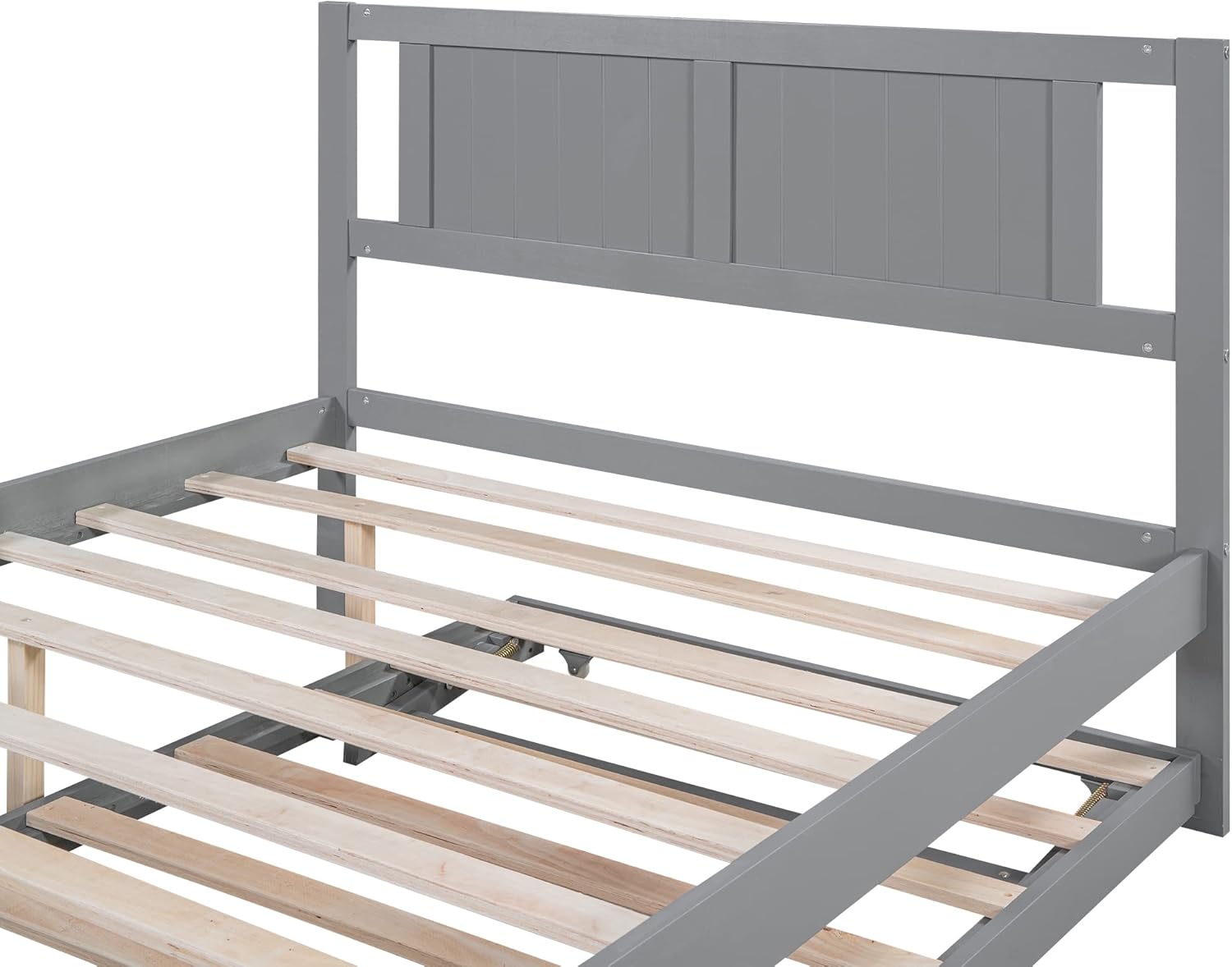 Detailed view of the headboard and the wooden slats on the main bed frame.