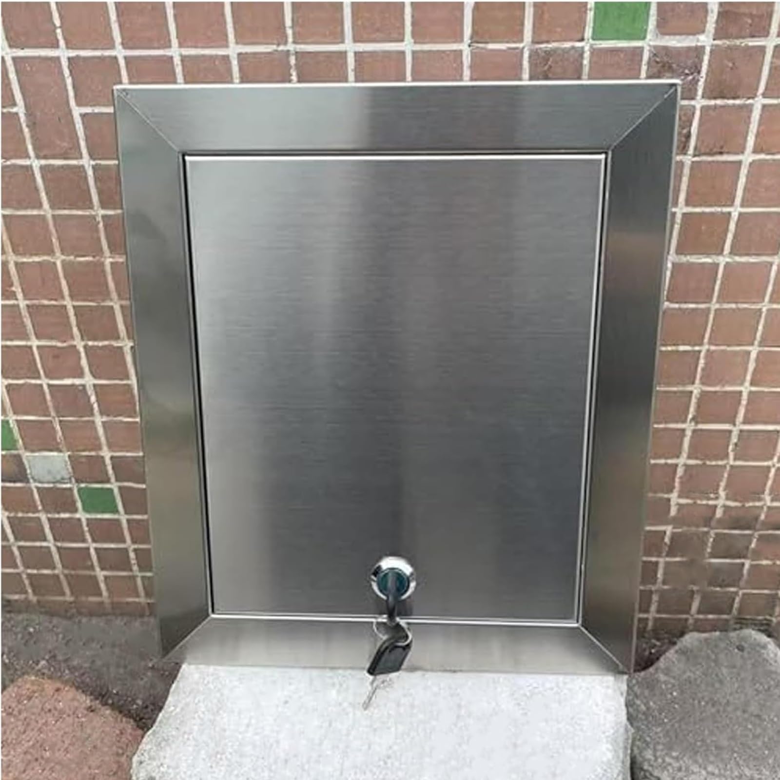 Puerta de inspección de acero inoxidable para registrar sistemas eléctricos en casa