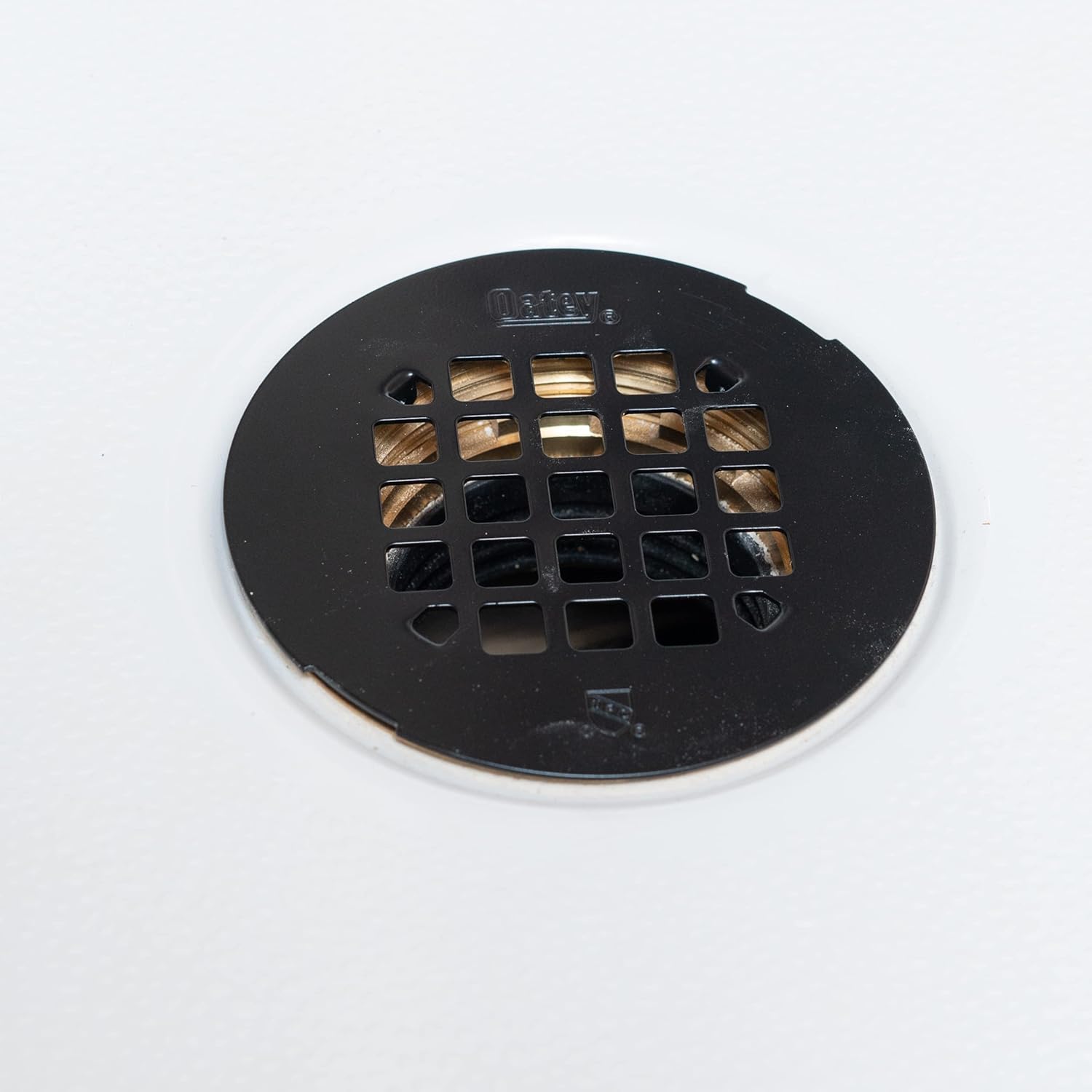 Universal 4-1/. Round Snap-Tite Shower Strainer, Matte Bla