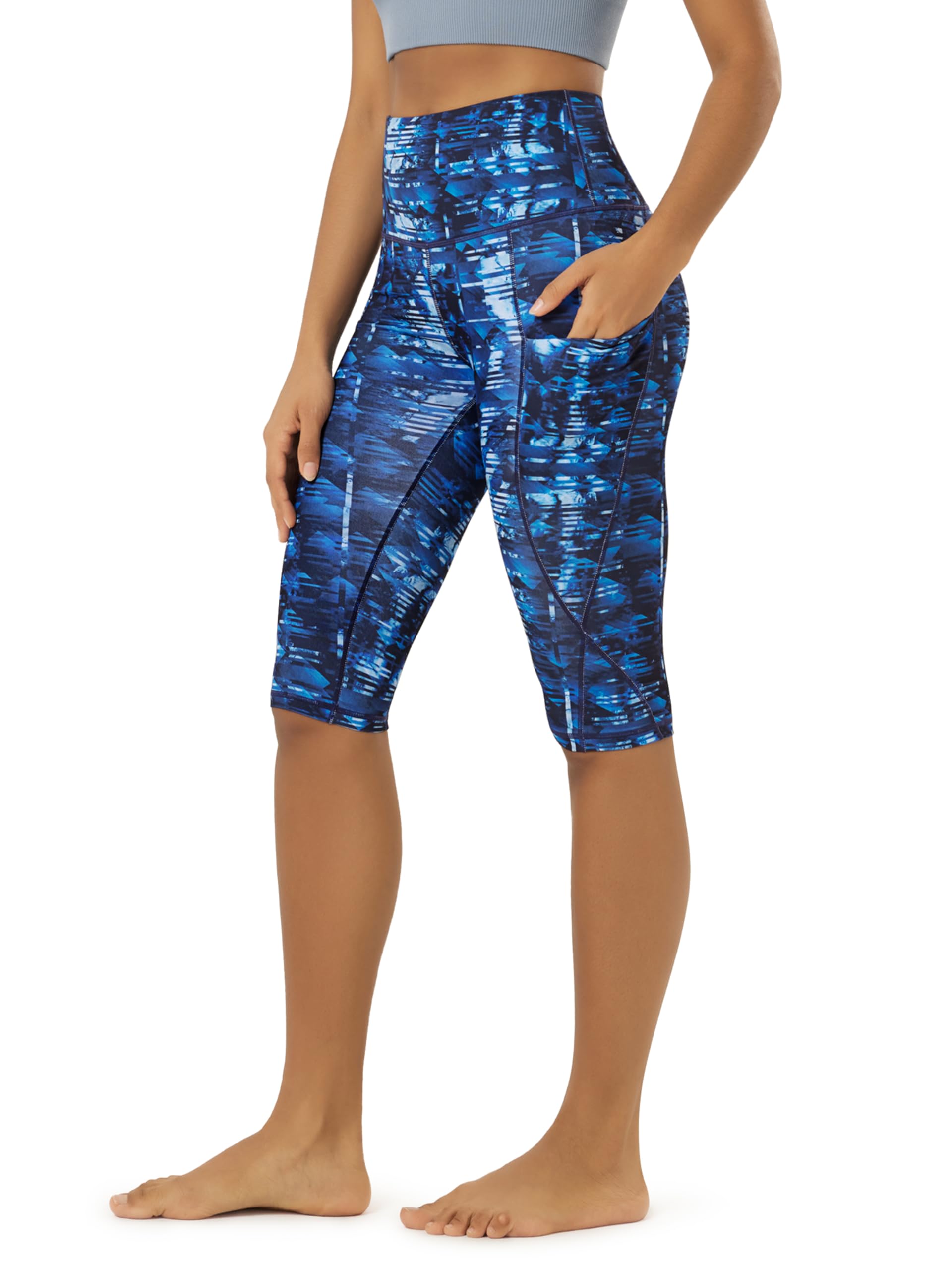 ODODOS Women's High Waisted Yoga Capris with Pockets, Tummy Control Non See Through Workout Athletic Running Capri Leggings
