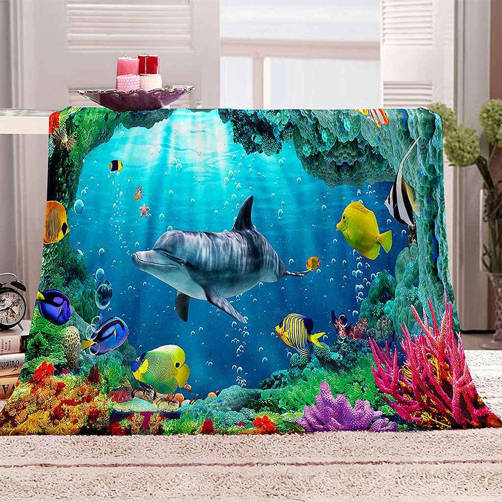 Couverture polaire baleine bleue pour soirée cocooning canapé et nuit douce toutes saisons