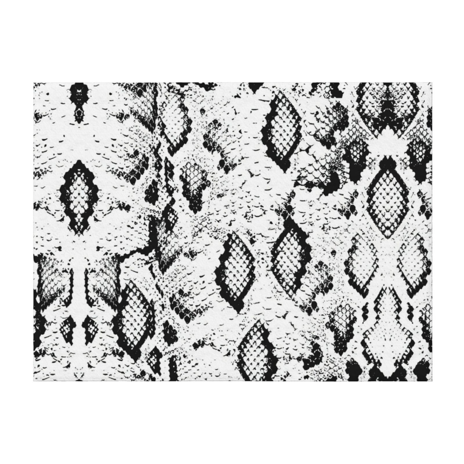 Plaid peau de serpent noir et blanc pour cocooning dans le salon