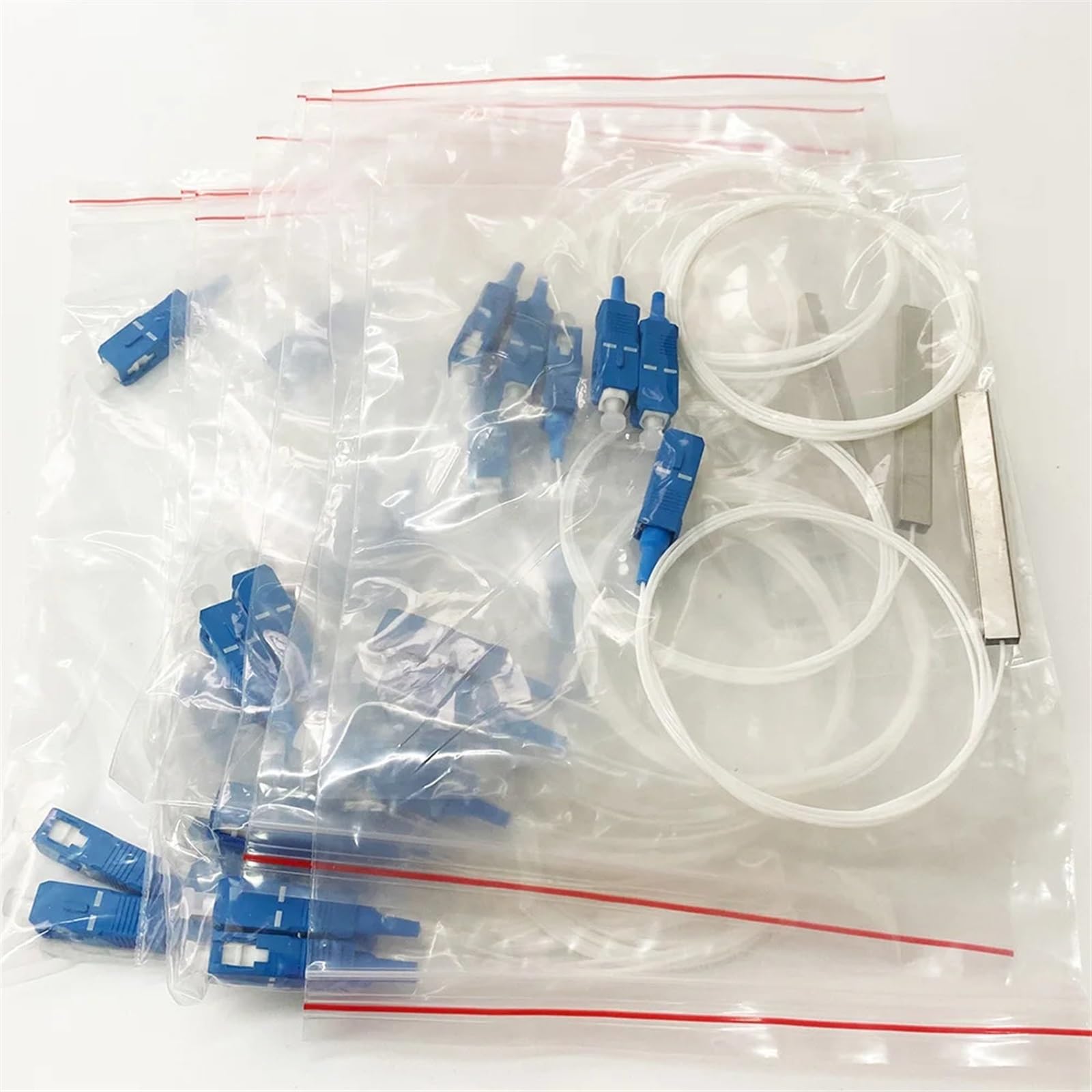 Câble à Fibre Optique Séparateur Optique SC UPC 0.9mm 1x2 FTTH, 10 pièces, séparateur de Fiber Optique SC UPC PLC coupleur Optique monomode Simplex, Tuyau en Acier PVC Cavalier Fibre Optique