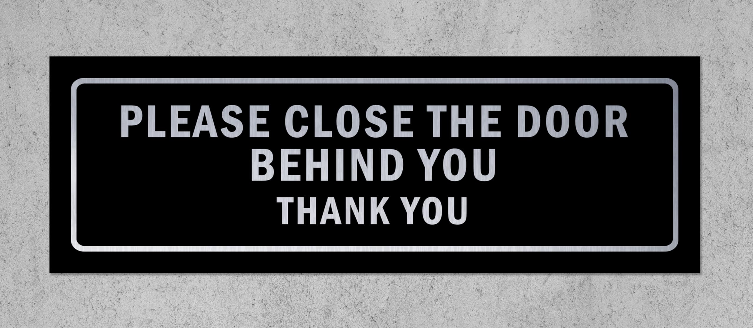 Please close the door behind you, thank you, black and grey sign - Self adhesive sticker (450mm x 150mm)
