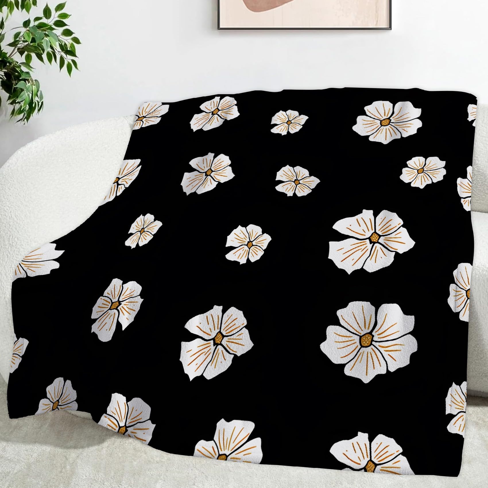 Plaid polaire fleurs noir et blanc pour canapé et salon épuré