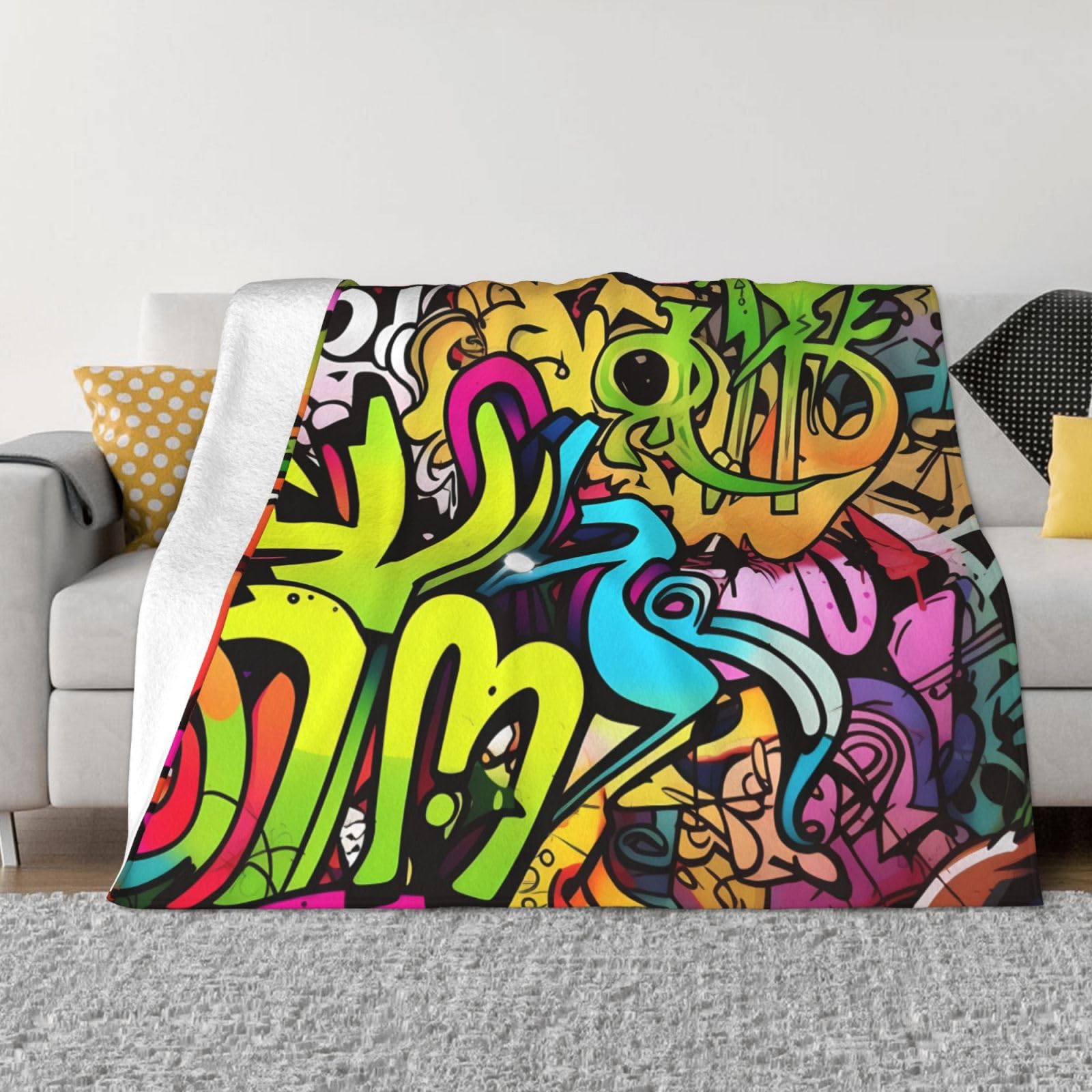 Couverture en micro polaire au style graffiti pour un cocon chaud et cosy