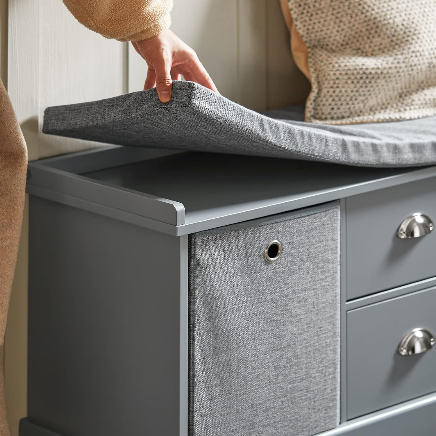 An open drawer of the SoBuy FSR66-DG storage bench, showing its interior and metal handle.