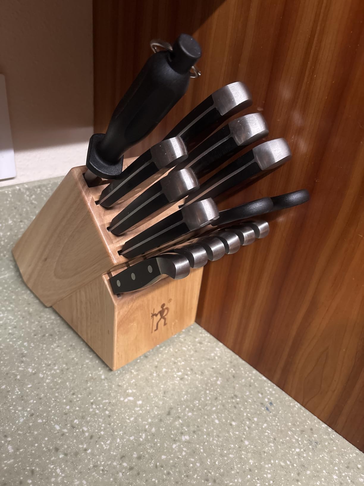 Henckels Statement chef knife set on wood block, hero image