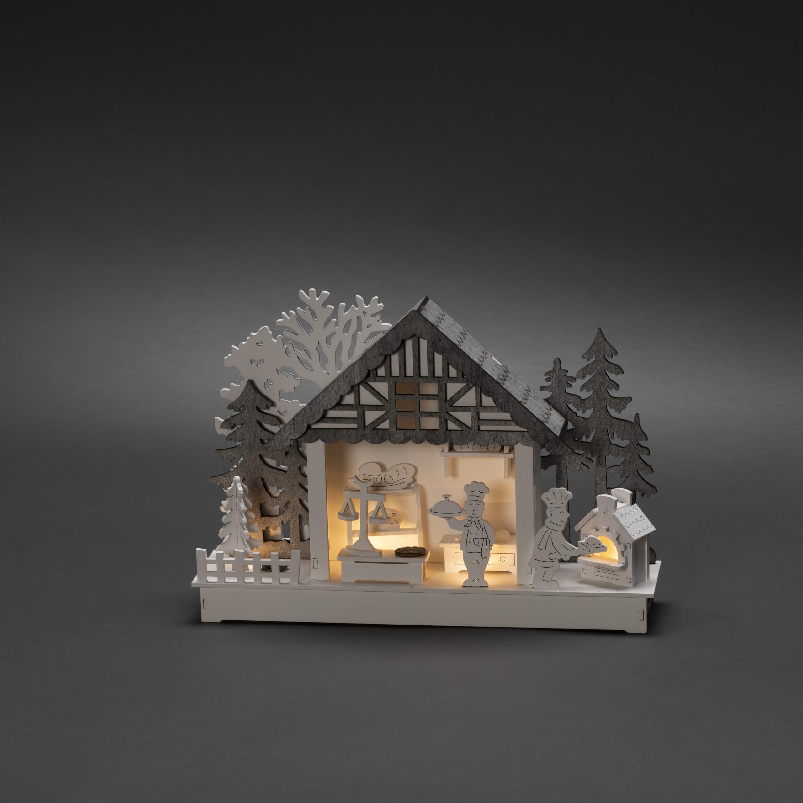 Konstsmide Silhouette en bois à LED, blanc, « maison et boulangerie », minuterie 6H, 4 diodes blanc chaud, à piles, intérieur, Câble transparent - 3262-210