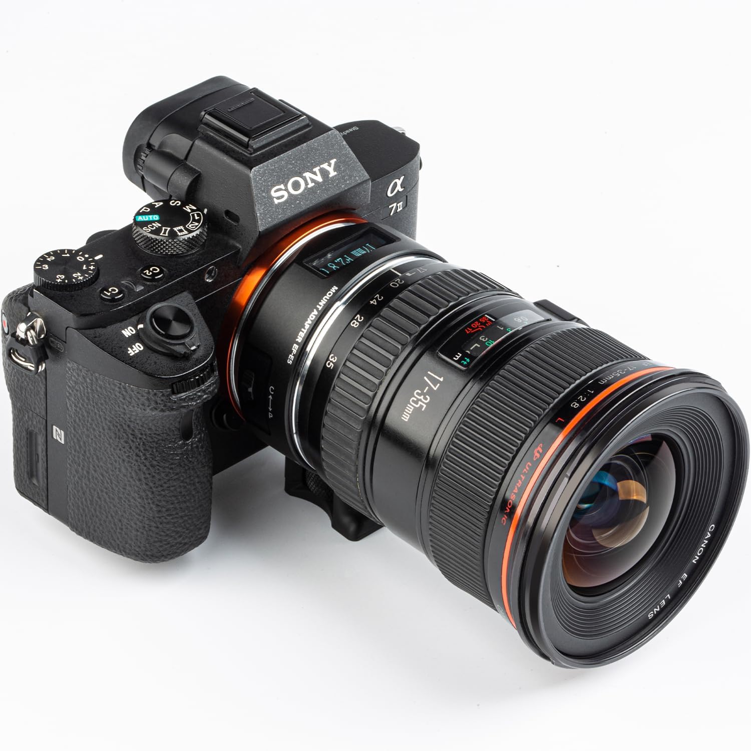 The VILTROX EF-E5 lens adapter and a Canon EF lens securely mounted on a Sony E-mount camera, demonstrating a complete setup.