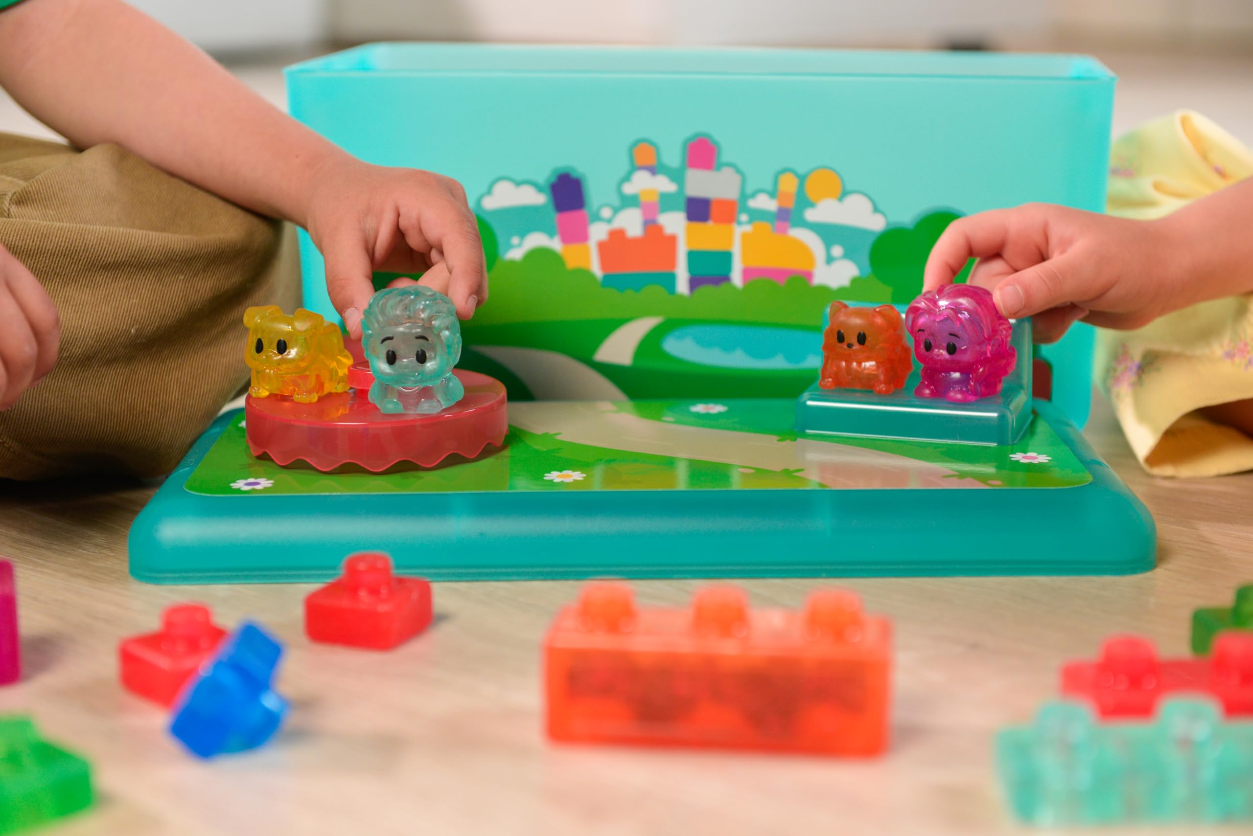 Goliath Jelly BLOX – Playground Store & Play Set | Juego de construcción sensorial 2+ | 30 Bloques Blandos y Coloridos con Personajes y Animales | Tapa-Tablero, Caja de almacenaje | Idea Regalo