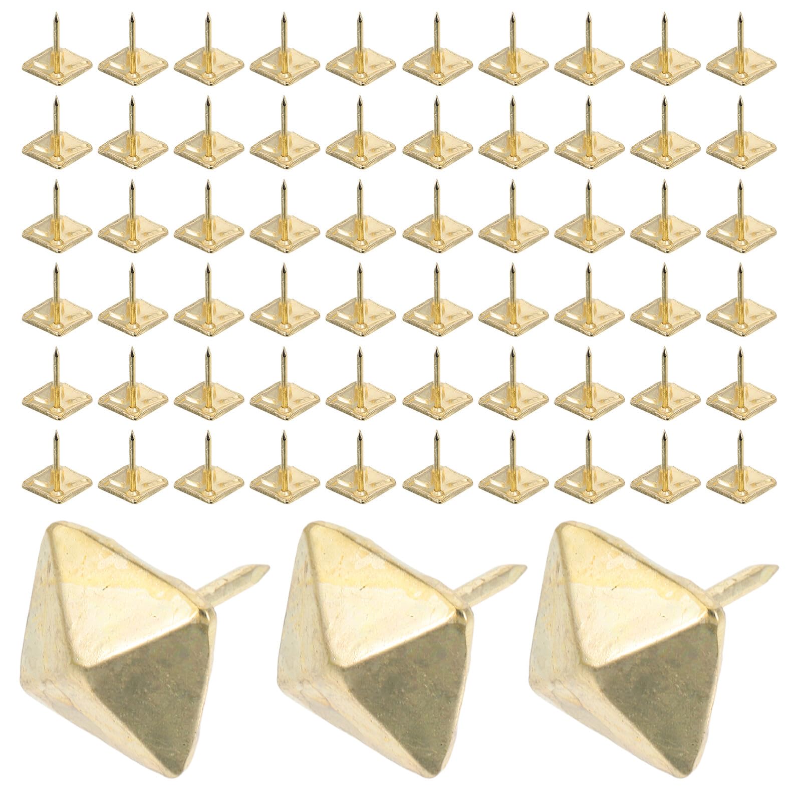 Chinchetas decorativas doradas contra tapizados sueltos en muebles de madera y corchos
