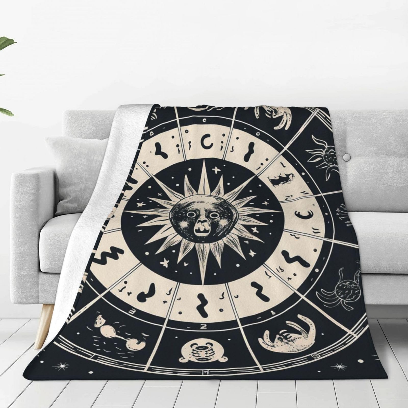 Couverture canapé motif astrologique pour vos soirées cocooning douillettes