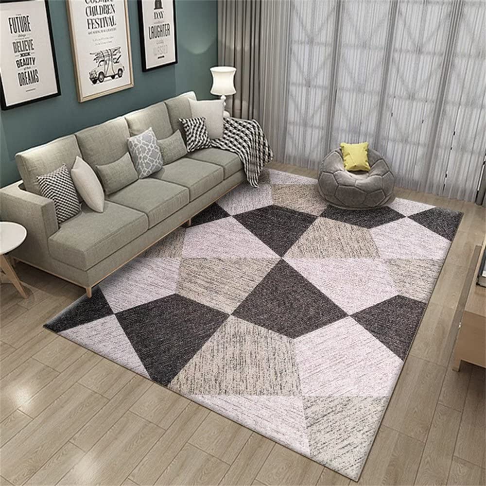 Tapis de chambre bébé fille gris pour un sol de jeux moderne et géométrique
