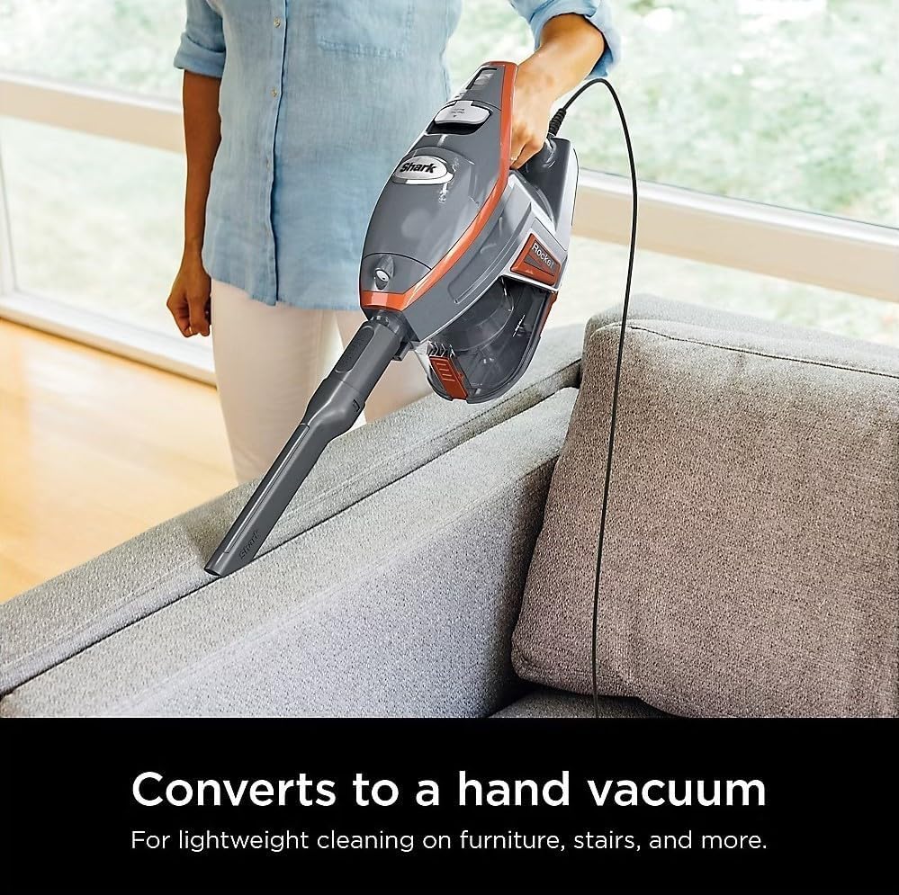 Person using Shark Rocket Pro as a hand vacuum