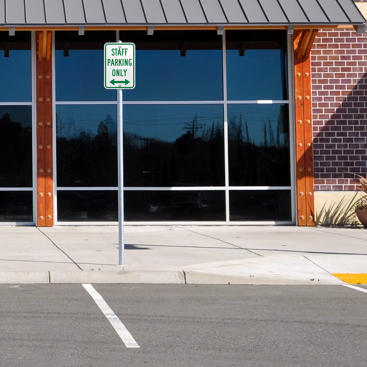 SmartSign 18 x 12 inch “Staff Parking Only” Metal Sign with Bidirectional Arrow, 63 mil Laminated Rustproof Aluminum, Green and White, Made in USA