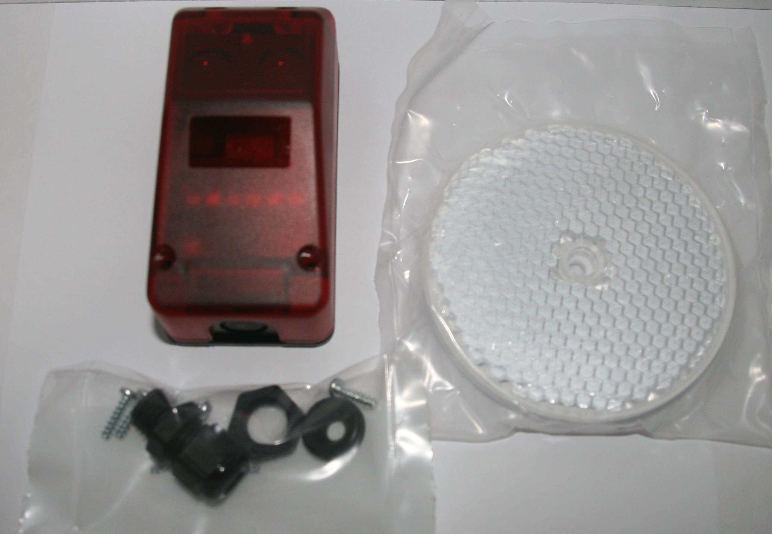 Fotocelula de reflexion con espejo RP 25 compatible con muchas marcas y modelos de motor o central de puerta automatica de garaje o parking y aplicaciones industriales, sensor de obstaculos
