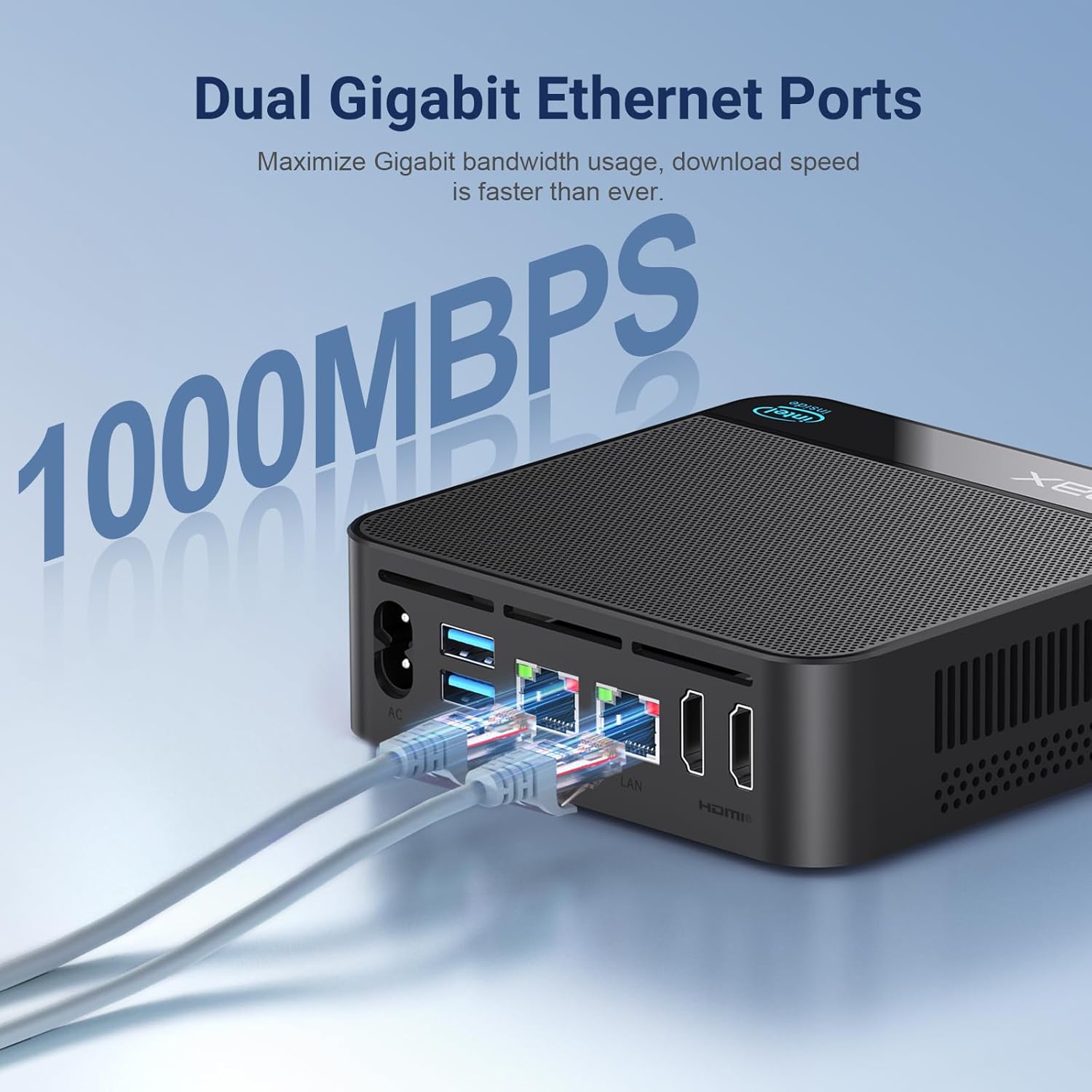 OUMAX Mini PC with two Ethernet cables connected to its dual Gigabit LAN ports.