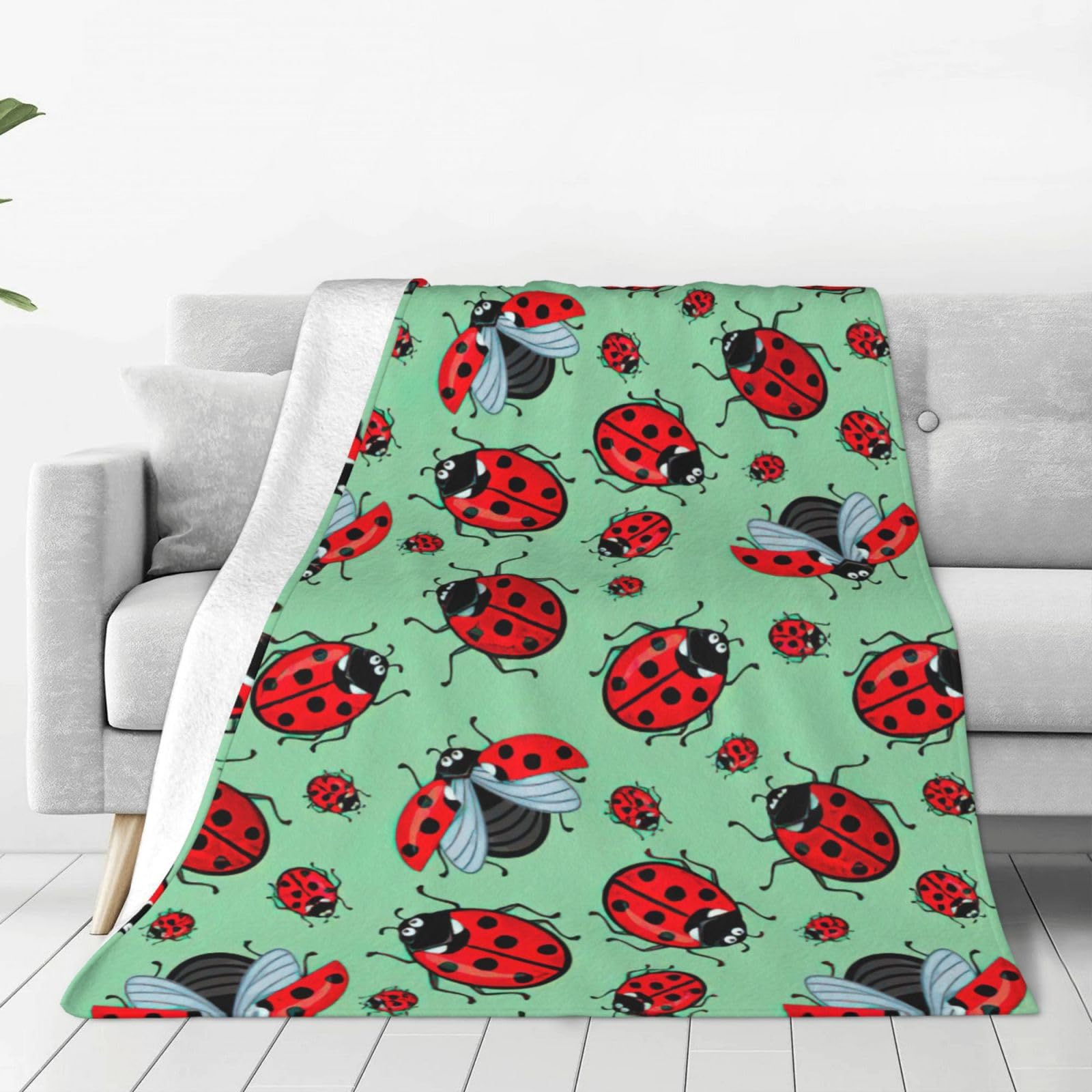 Couverture polaire douce et chaude coccinelle pour envelopper toute la famille de tendresse