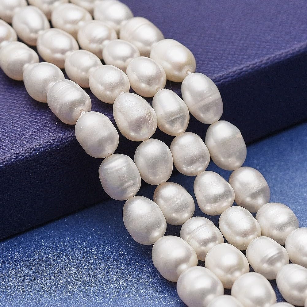 Boutigem 35Pcs Natural Cultured Freshwater Pearl Beads White Oval Shaped Pearl Beads 6.5~7mm for Jewelry Making
