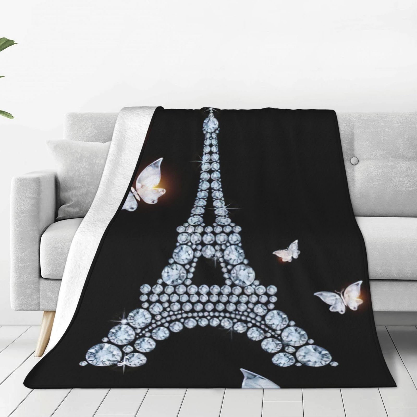 Couverture polaire douce pour cocooning sur le canapé motif Tour Eiffel