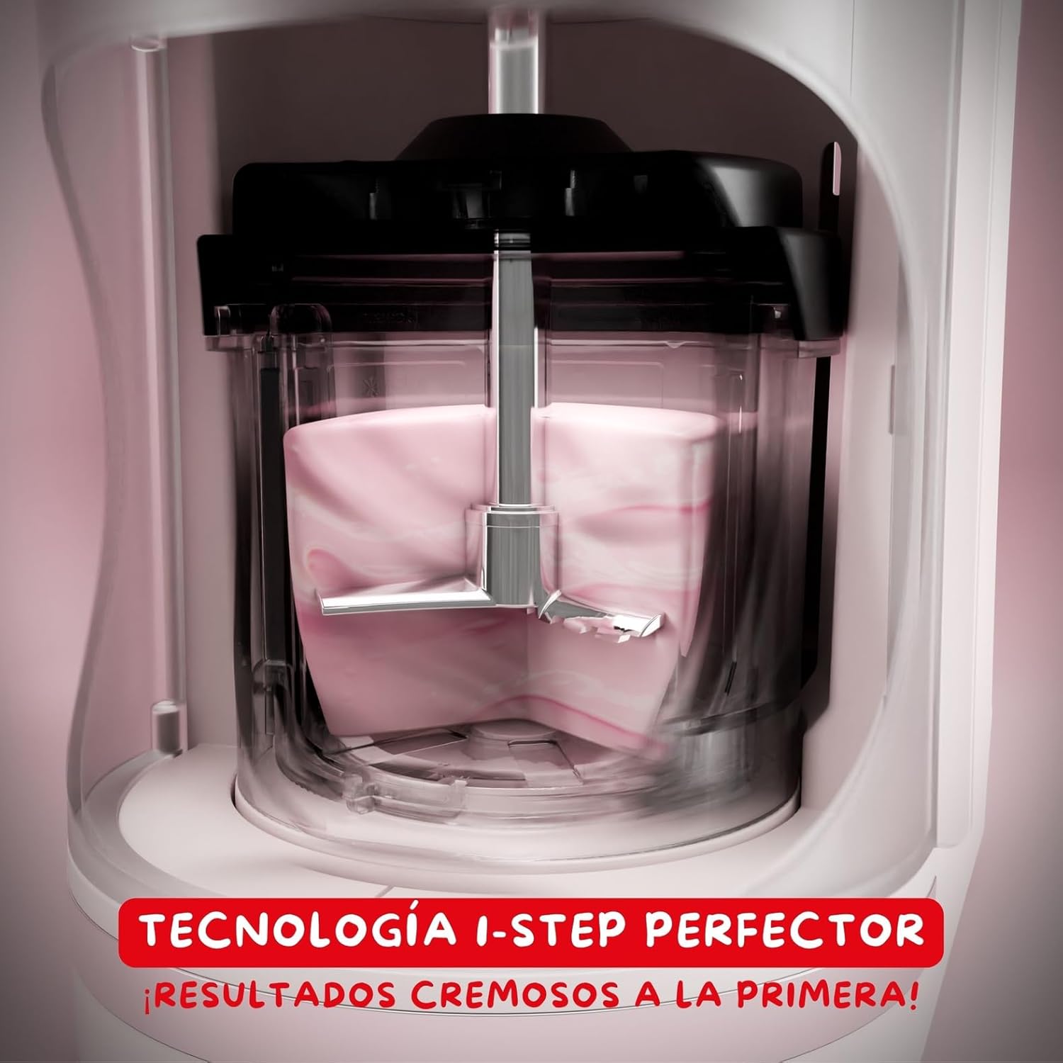 Close-up of the 1-Step Perfector technology in action, showing the mixing paddle churning a pink frozen mixture inside the bowl, with text indicating 'Creamy results on the first try!'