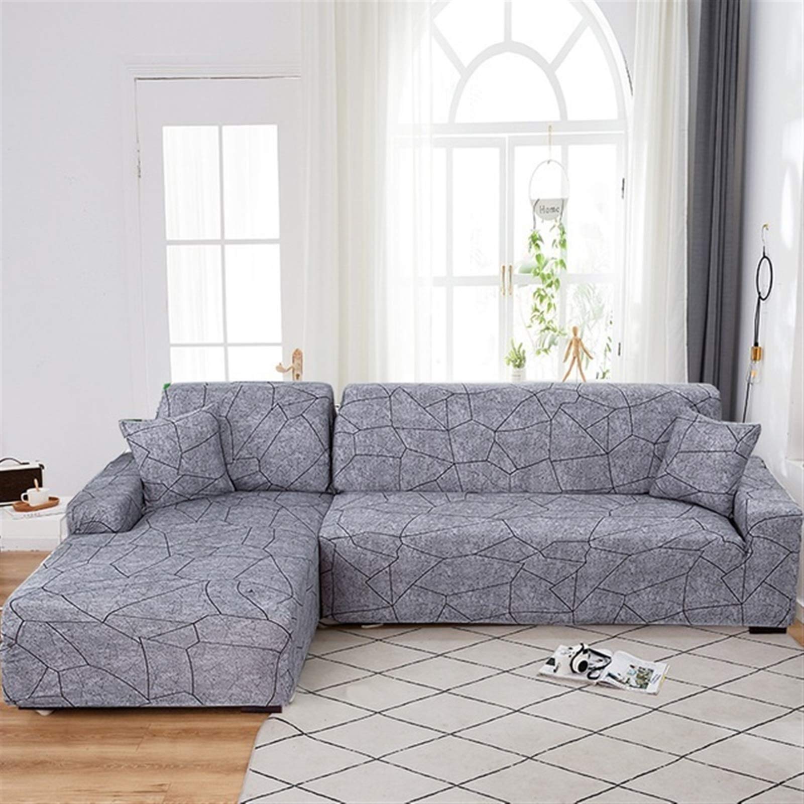 Housse de canapé extensible pour rafraîchir le salon familial avec un fauteuil 1 place